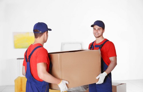 Moving crew using PPE during a furniture relocation