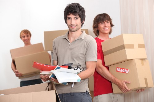 Professional movers loading commercial items for transport in Aberdeen
