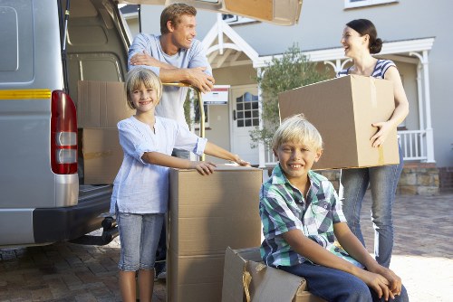 Mover handling furniture carefully during relocation