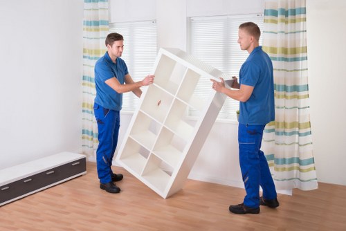Local movers handling household furniture during an Aberdeen move