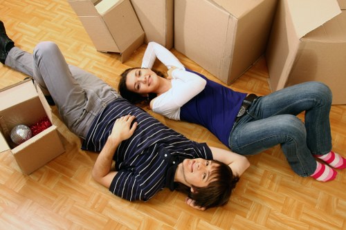 Loading furniture into a removals van in Aberdeen city streets