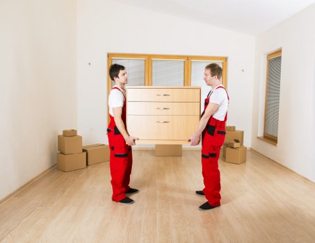 Prepared boxes and furniture ready for a moving truck in Aberdeen