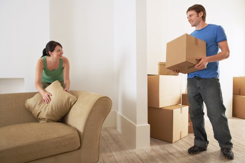 Worker assessing hazards during a property removal